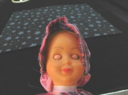 dollhouse doll pink check face